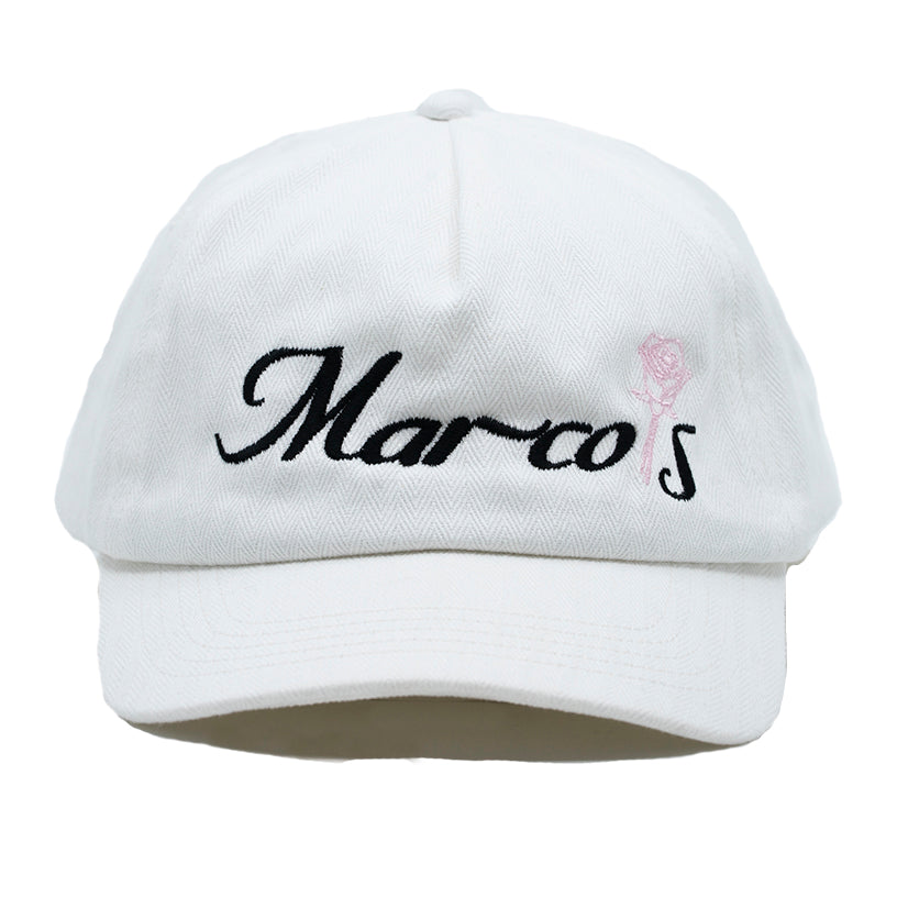 White baseball hat with Marco's bar logo and pink rose on the front